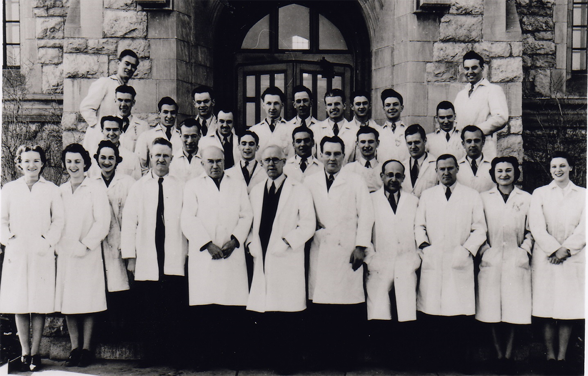 College of Medicine (then the School of Medical Sciences), Class of 1940. Dr. Rhonda Collins (nee Boughton) is seen here in the front row on the far right.