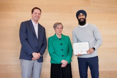 Dr. Marwaha receives award.