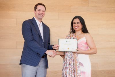 Dr. Bhat receives award.