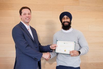 Dr. Marwaha receives award.