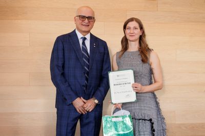 Dr. Schellenberg receives award.