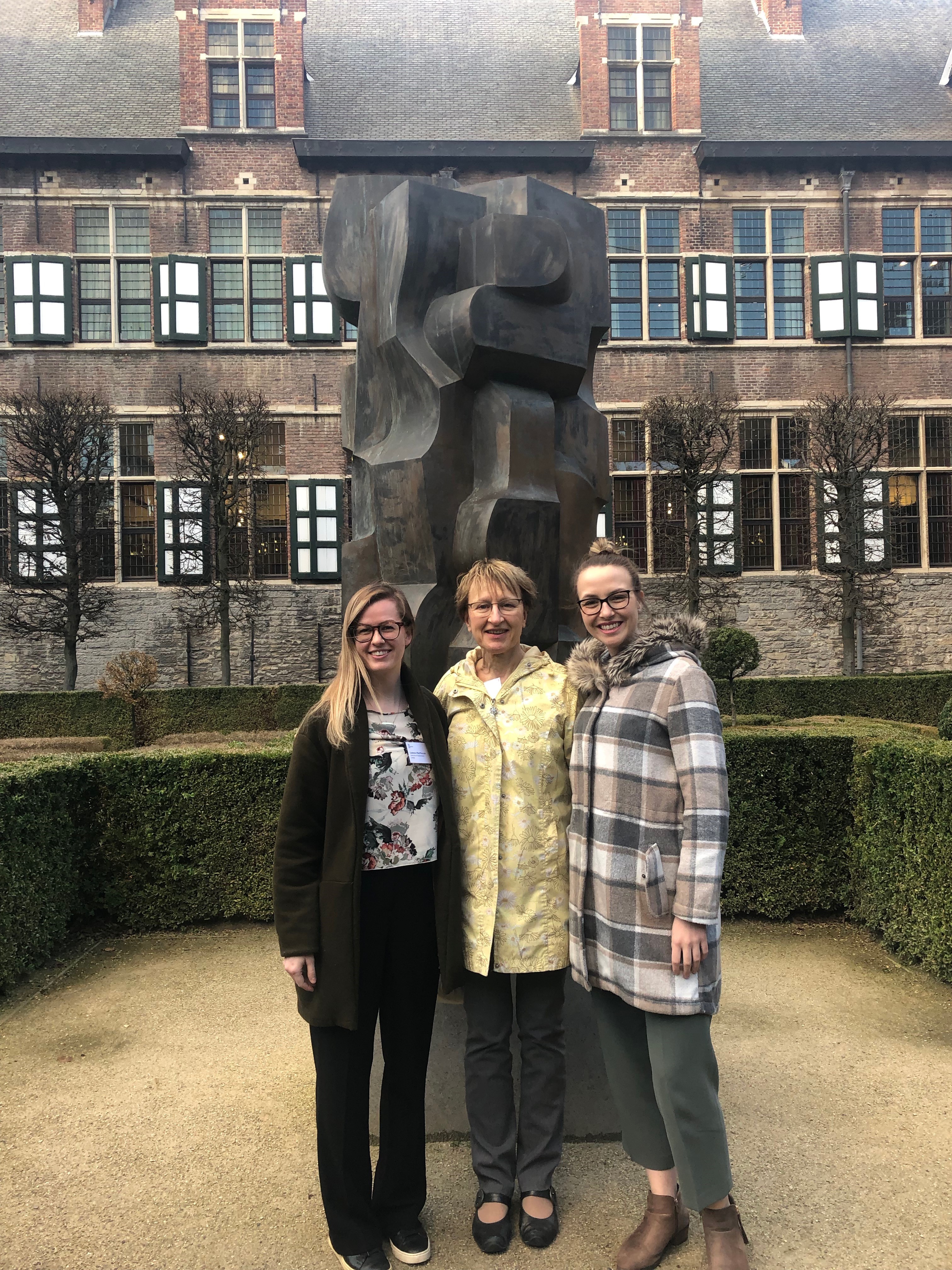 Cadence MacPherson, left, and Hope Fast, right, pose for a photo with Dr. Lilian Thorpe in Ghent, Belgium. 