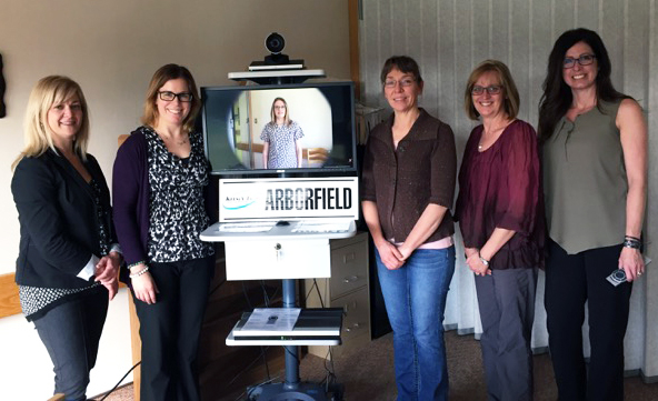 Dr. Lovo-Grona, Dr. Bath, Louise Kowal, Joanne Lussier (Arborfield), and Michelle Hrychuck (Kelsey Trail Telehealth Co-ordinator) with the Arborfield telehealth unit.