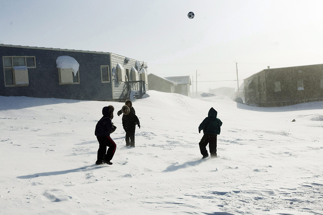 Children play soccer in the small town of Baker Lake, Nunavut in 2009. Research among children with arthritis globally shows that those residing in northern latitudes have abnormally low vitamin D levels. (Photo: THE CANADIAN PRESS/Nathan Denette)