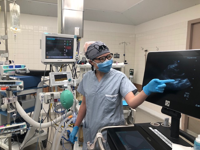 Anesthesiology resident Anine Yu is shown using point-of-care ultrasound (POCUS) in an operating room as part of her training. (Photo submitted)