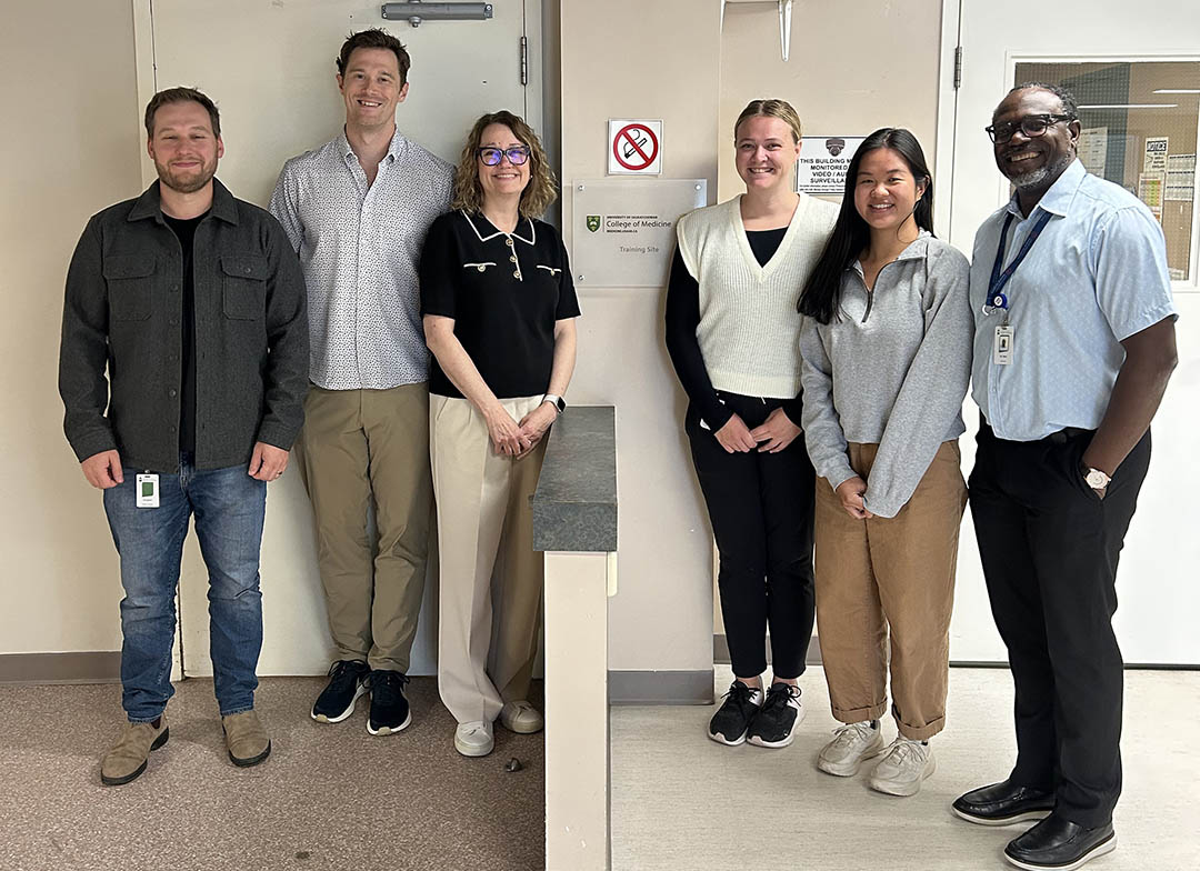 MD students Riley Bentham, Jade Ong-Tone, and Zoe Douglas with Drs. Geoff Zerr (MD) and Sarah Forgie (MD) and Yemi Laosbikan at the Melfort SLIC site. (Photo: Submitted)  